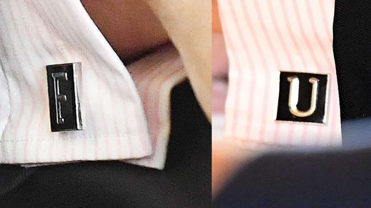 Two cufflinks worn by State MP for Kawana, Jarrod Bleijie.