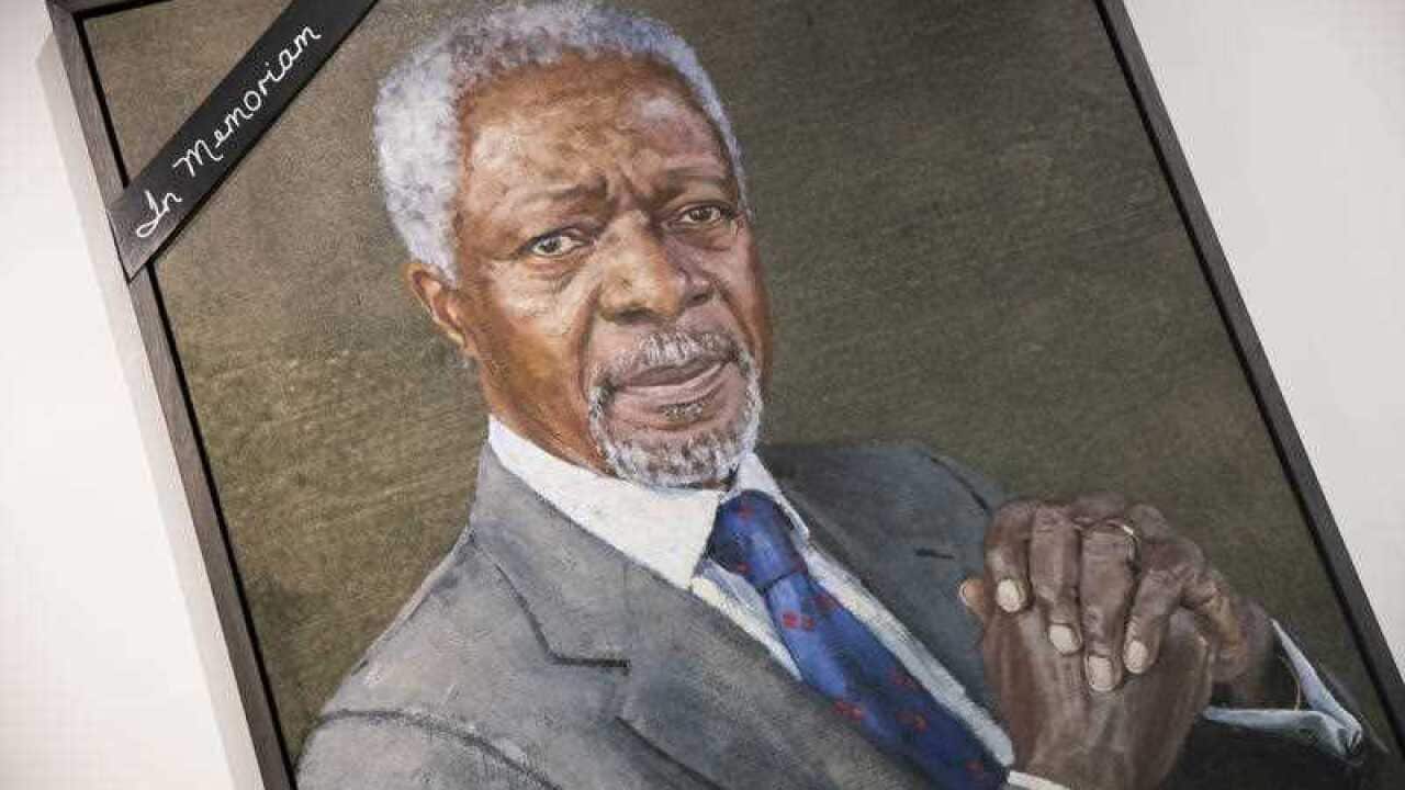 A black ribbon adorns the portrait of former United Nations Secretary-General Kofi Annan at UN headquarters