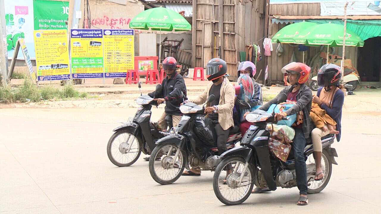 Travel on motor bicycle in Cambodia