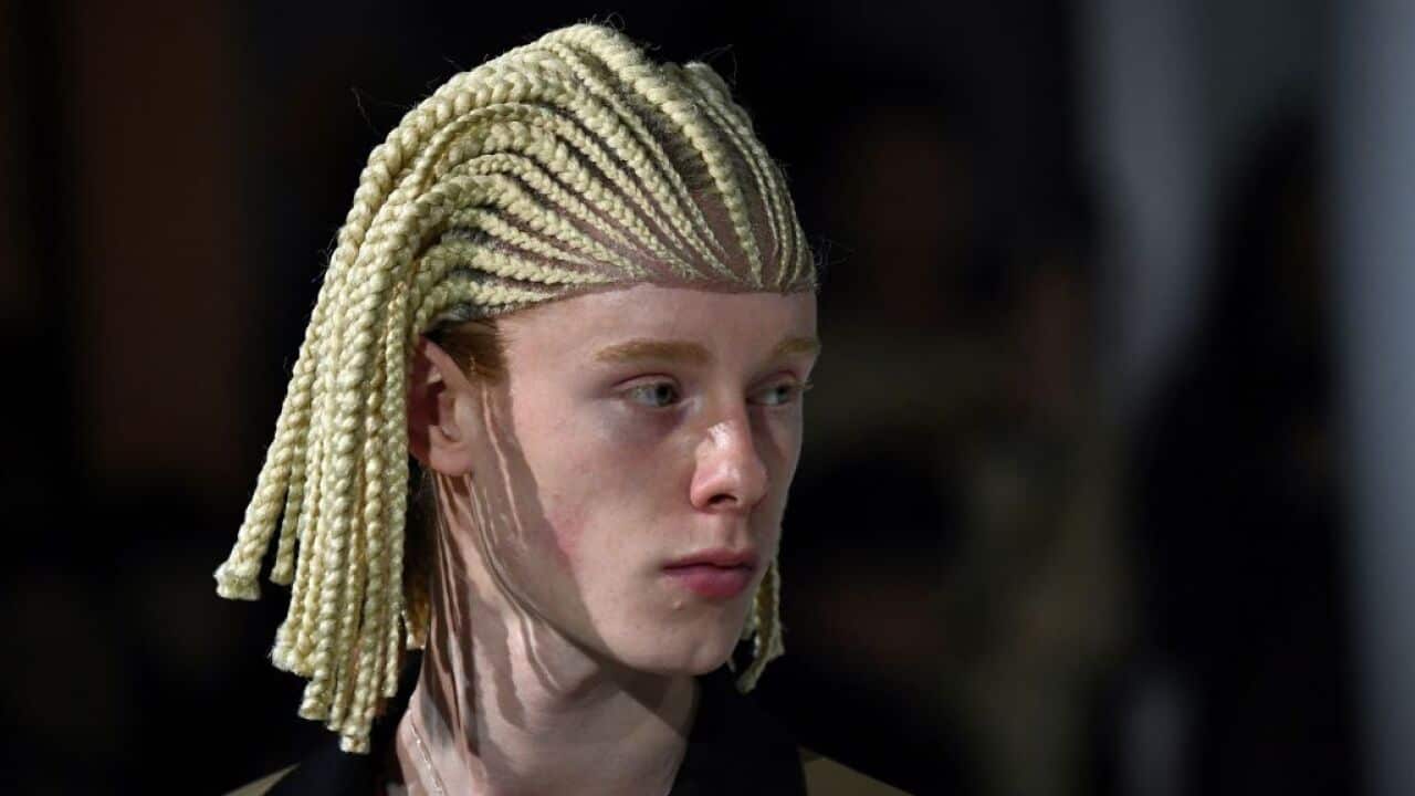 A model wears a wig in the Comme Des Garons fashion show in Paris.
