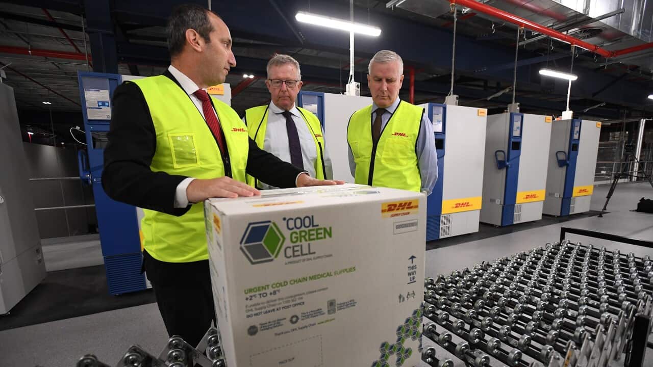 Deputy Prime Minister Michael McCormack and Minister for Regional Health Mark Coulton inspect fridges which will be used to store COVID-19 vaccines in Sydney.