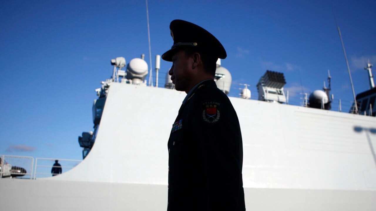 Chinese People's Liberation Army ships are welcomed by Royal Canadian Navy from CFB Esquimalt during a ceremonial visit to Ogden Point Pier in Victoria