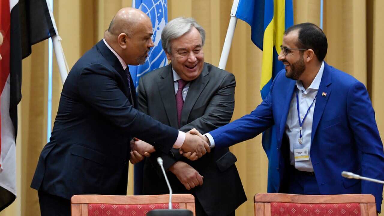 Head of delegation for rebel forces known as Houthis, Mohammed Abdulsalam (R), Yemen Foreign Minister Khaled al-Yaman (L) with the UN Secretary General.