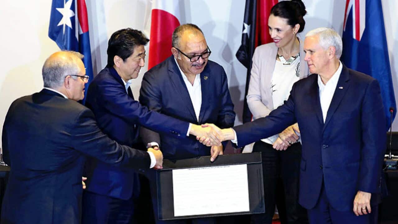 اسکات موریسون نخست وزیر استرالیا (سمت چپ) در نشست APEC