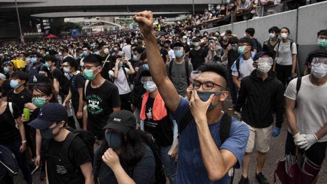 A protester chants against the Chief Executive of Hong Kong Carrie Lam during the demonstration.