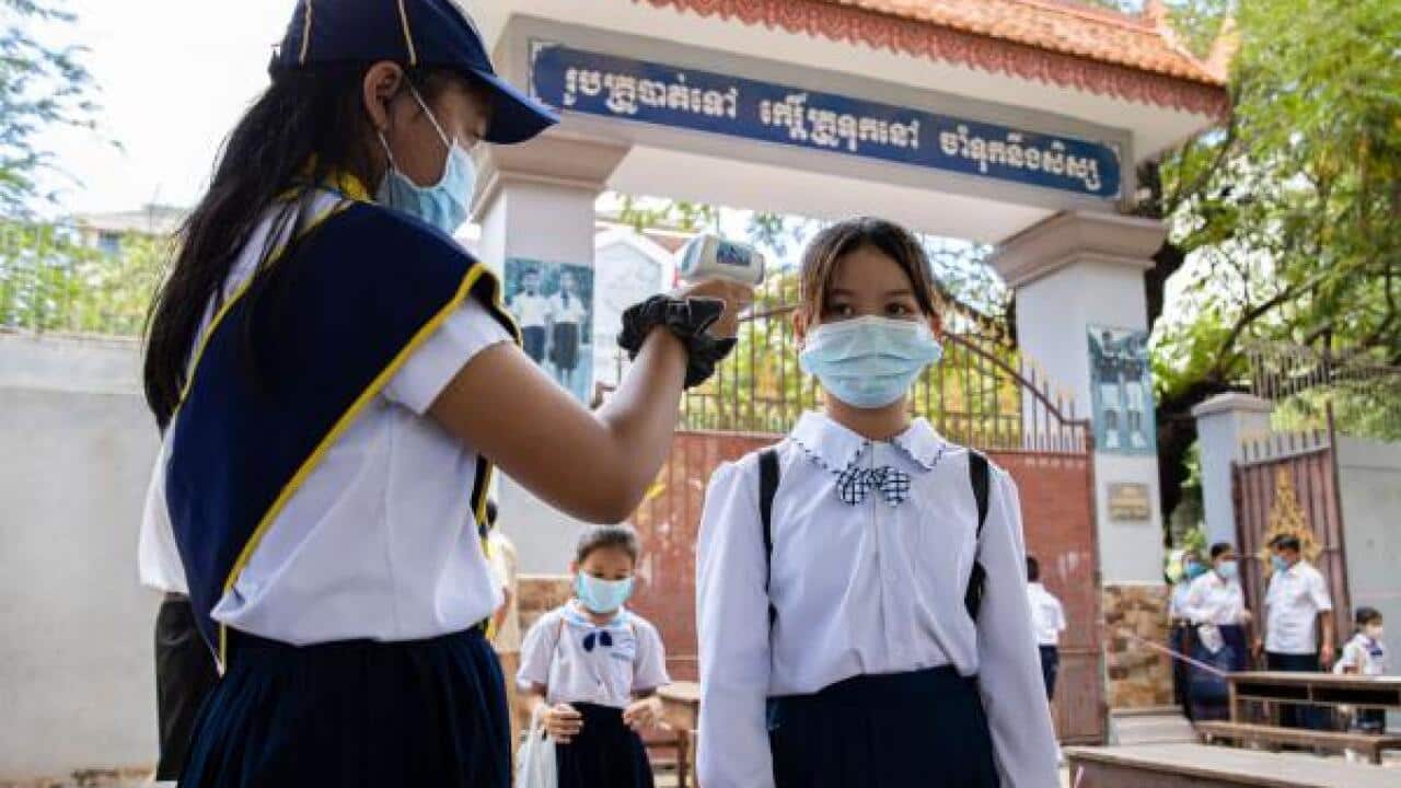 Temperature checked at school in Cambodia