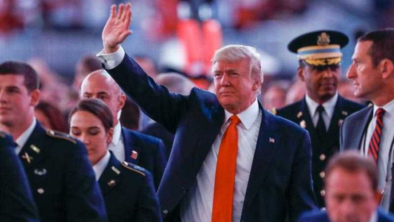 US President Donald J. Trump attends the College Football Playoff National Championship game between the University of Alabama and the University of Georgia at Mercedes-Benz Stadium in Atlanta, Georgia
