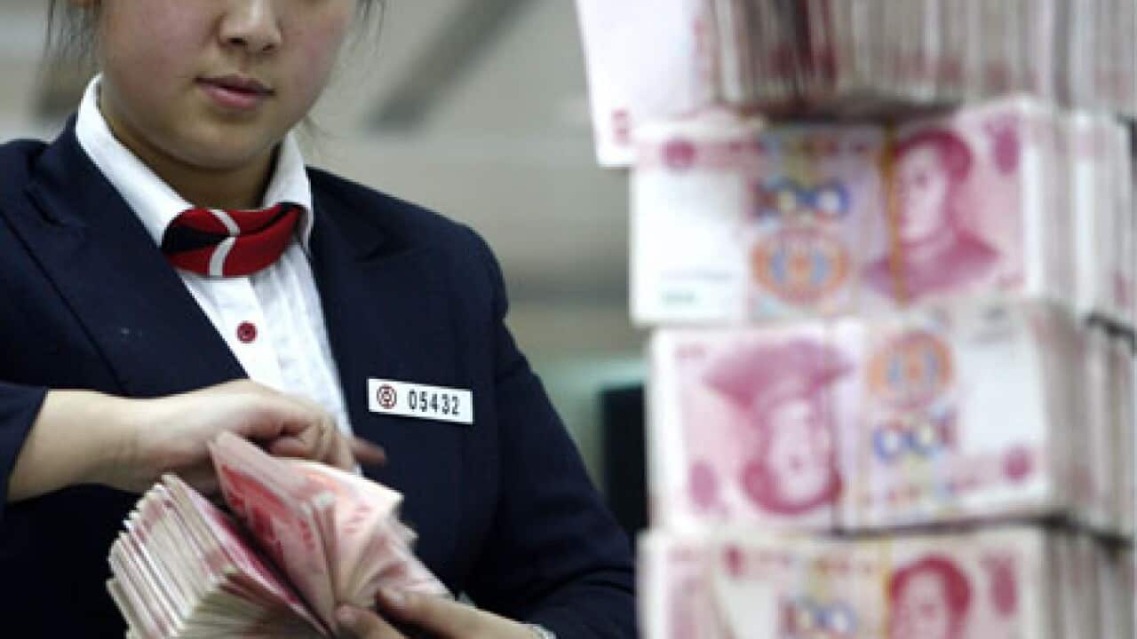 yuan_currency_b_100322_epa_118658886