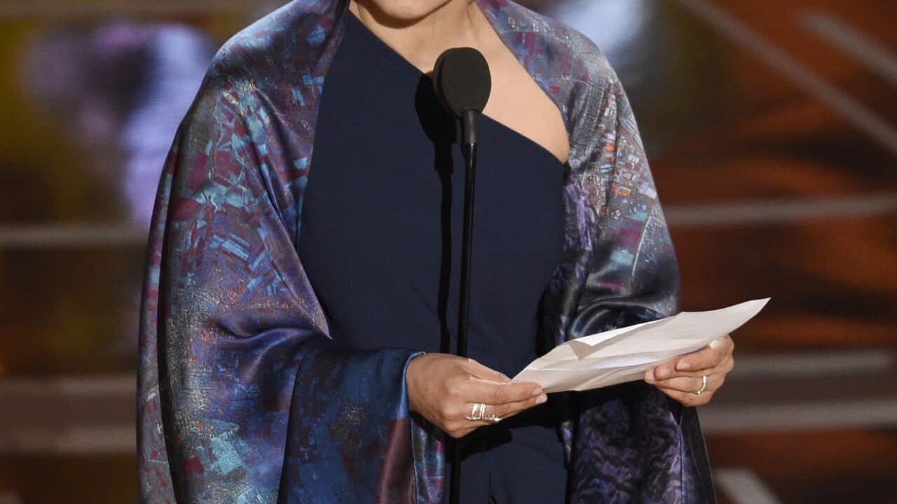 Anousheh Ansari accepts the award for best foreign language film for "The Salesman" on behalf of Asghar Farhadi at the Oscars on Sunday, Feb. 26, 2017, at the Dolby Theatre in Los Angeles. (Photo by Chris Pizzello/Invision/AP)
