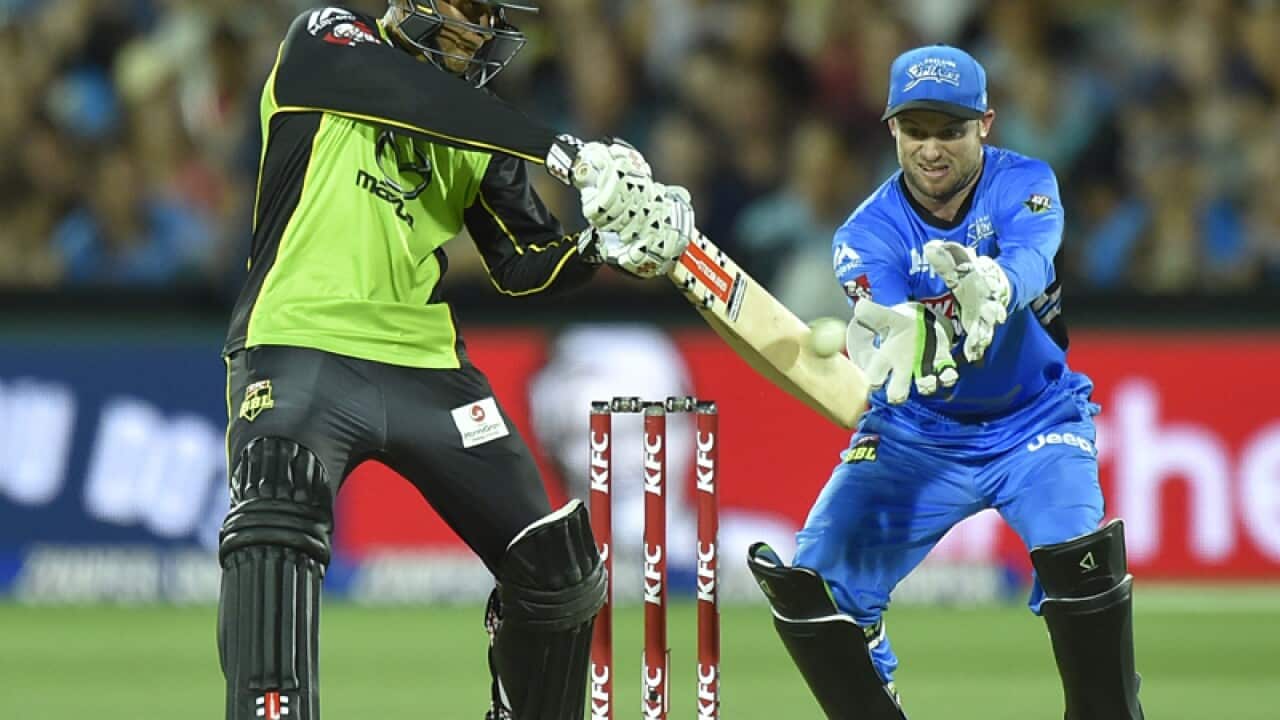Sydney Thunder's Usman Khawaja plays a shot