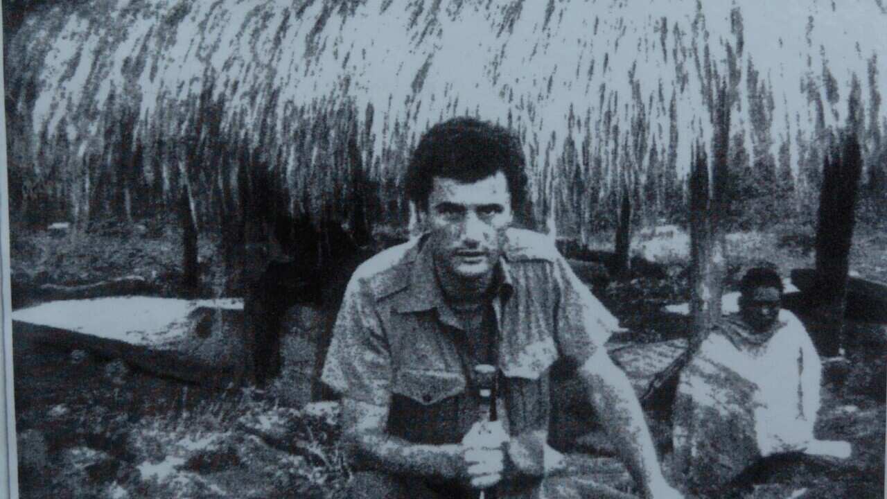 A file copy photograph of Greg Shackleton posted on a wall outside the New South Wales Coroners Court, Sydney.