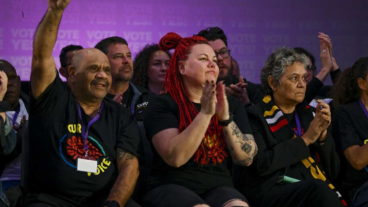 Member of the audience in Adelaide react to remarks by Prime Minister Anthony Albanese who has set October 14 as the Indigenous Voice to Parliament referendum date. (Mark Brake/AAP)
