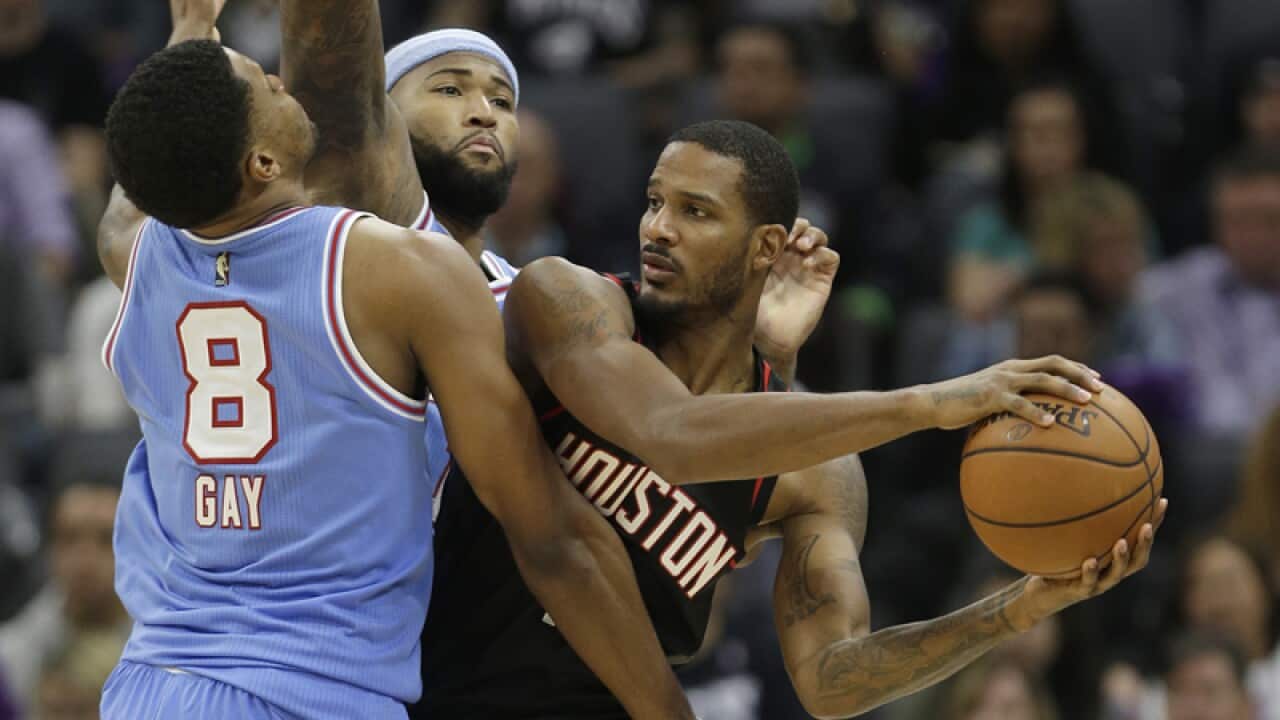 Houston Rockets forward Trevor Ariza, right, and Kings' Rudy Gay