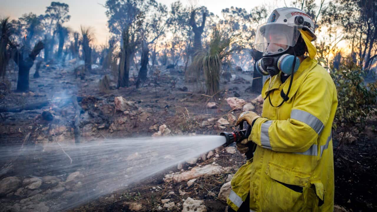 Fire crews work on a bushfire in Yanchep, Western Australia.