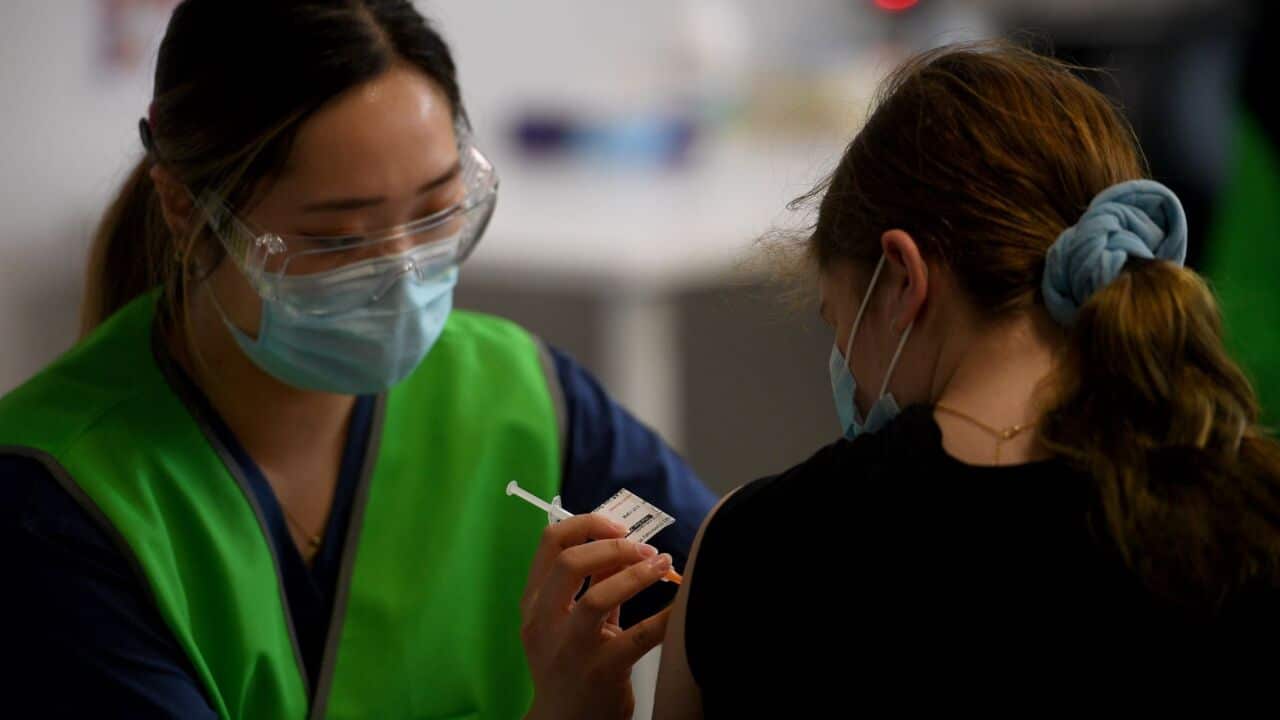 A member of the community is seen receiving a Covid vaccine at the Kimberwalli Aboriginal Covid-19 vaccination Hub in Whalan, west of Sydney,