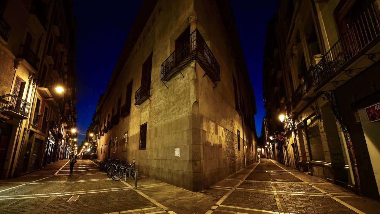 A lone pedestrian in Pamplona, Spain