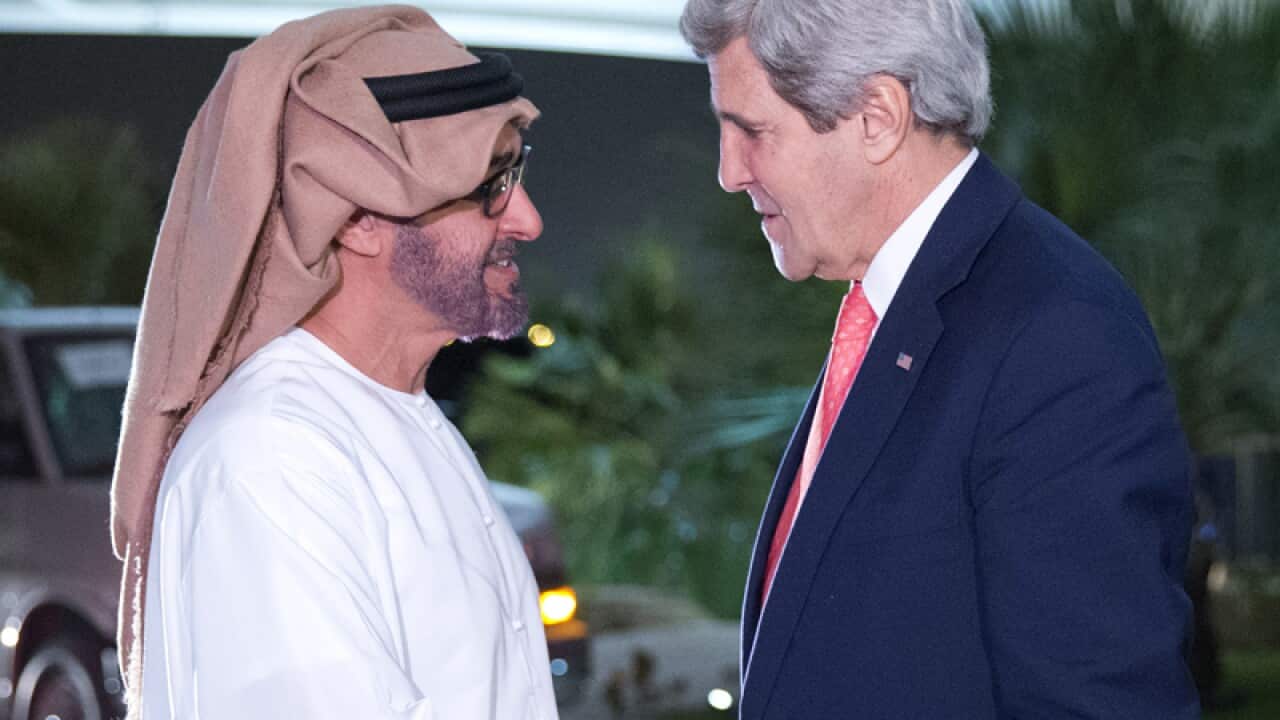 US Secretary of State John Kerry (R)
