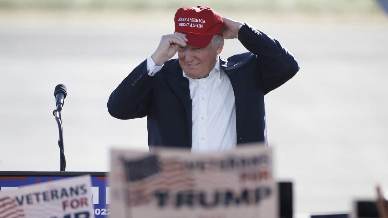Republican presidential candidate Donald Trump wears his hat at a rally, Wednesday, June 1, 2016, in Sacramento, Calif. (AP Photo/Jae C. Hong)