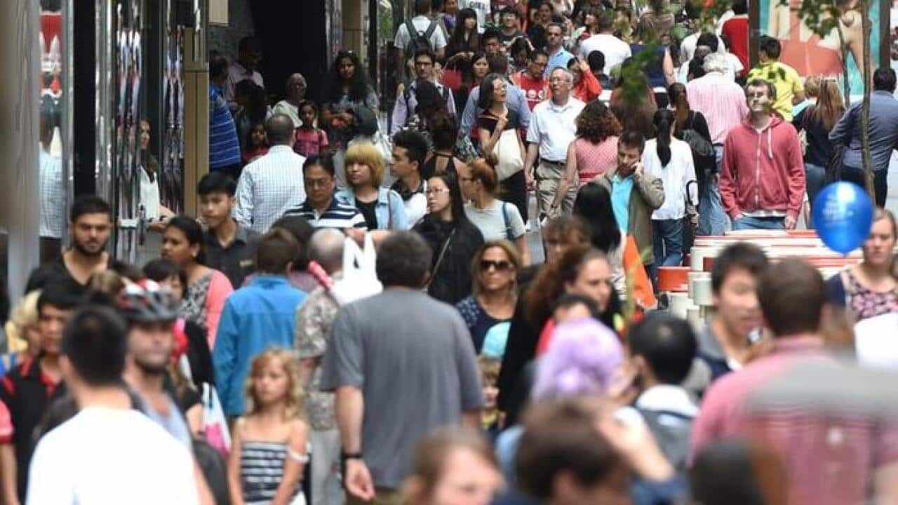 File Photo: Huge crowds fill Pitt Street Mall and the CBD shopping district as they purchase their last minute christmas gifts on Christmas Eve in Sydney, Wednesday, Dec. 24, 2014. (AAP Image/Dean Lewins) NO ARCHIVING