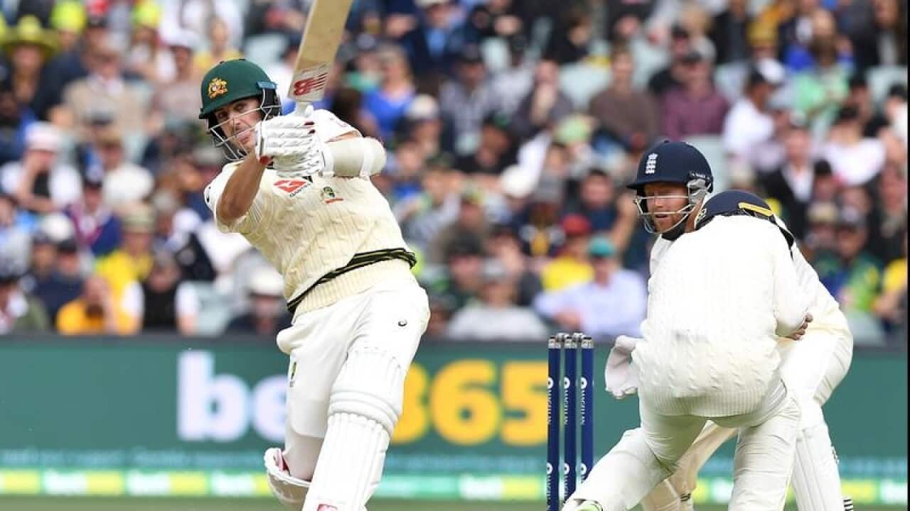 Australian batsman Pat Cummins plays a shot on Day 2.