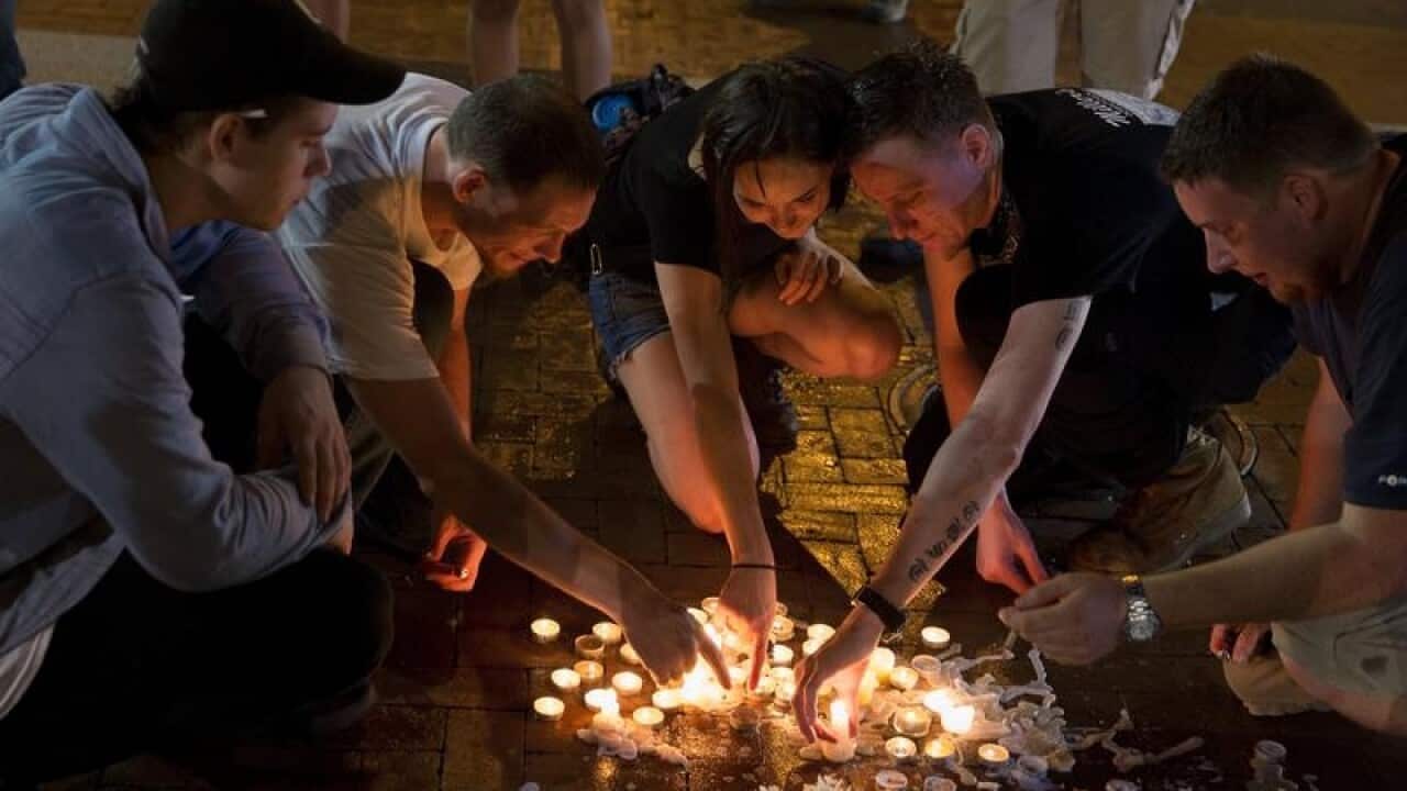 A vigil following a fatal rally