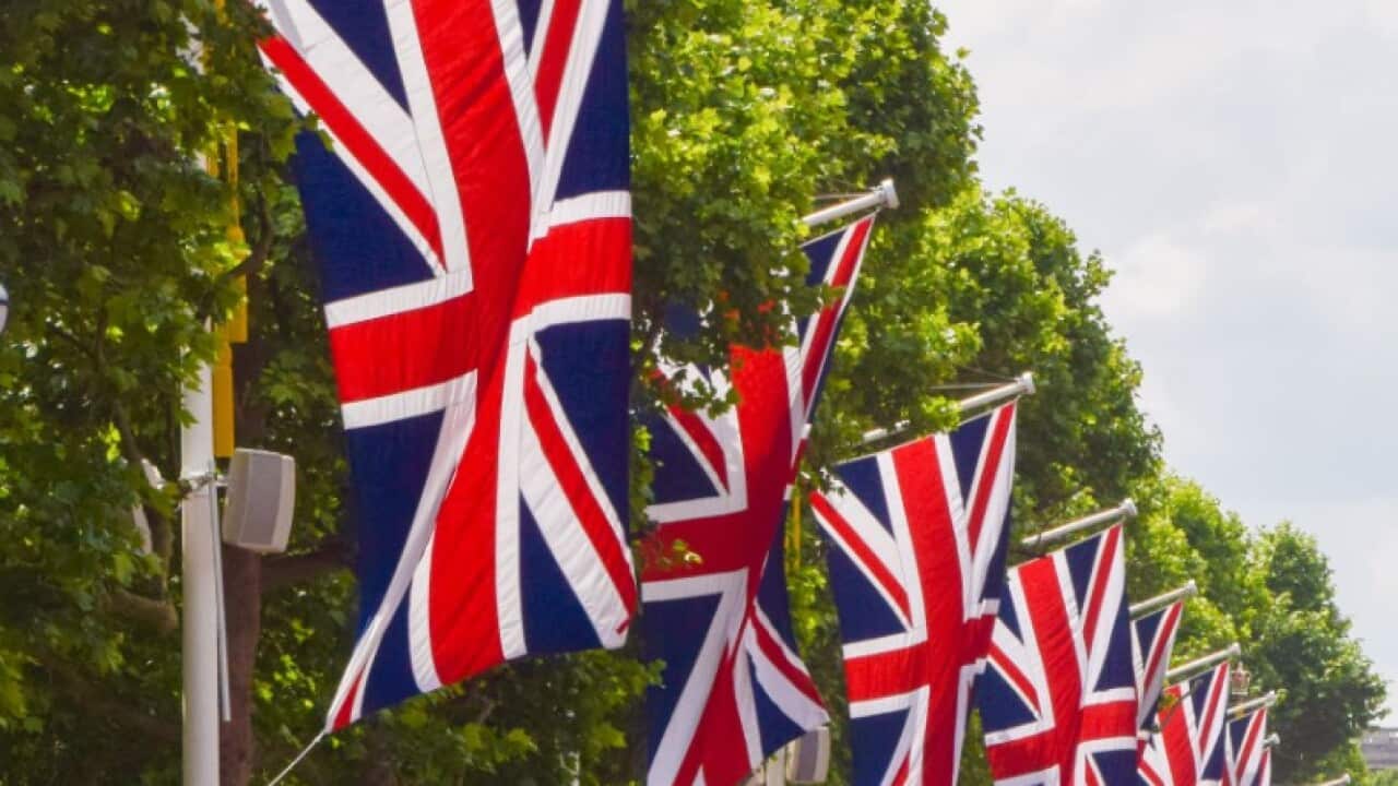 A large crowd is seen on The Mall leading to Buckingham Palace during the celebrations.