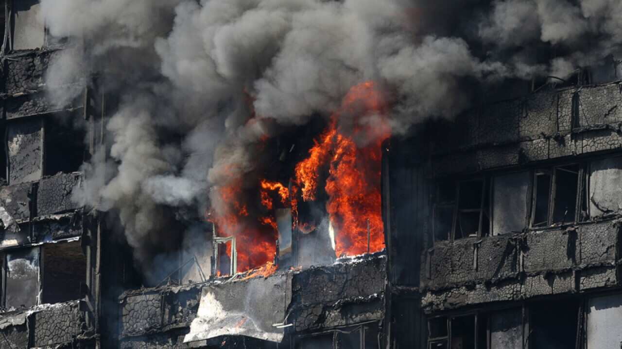 Smoke billows from Grenfell Tower