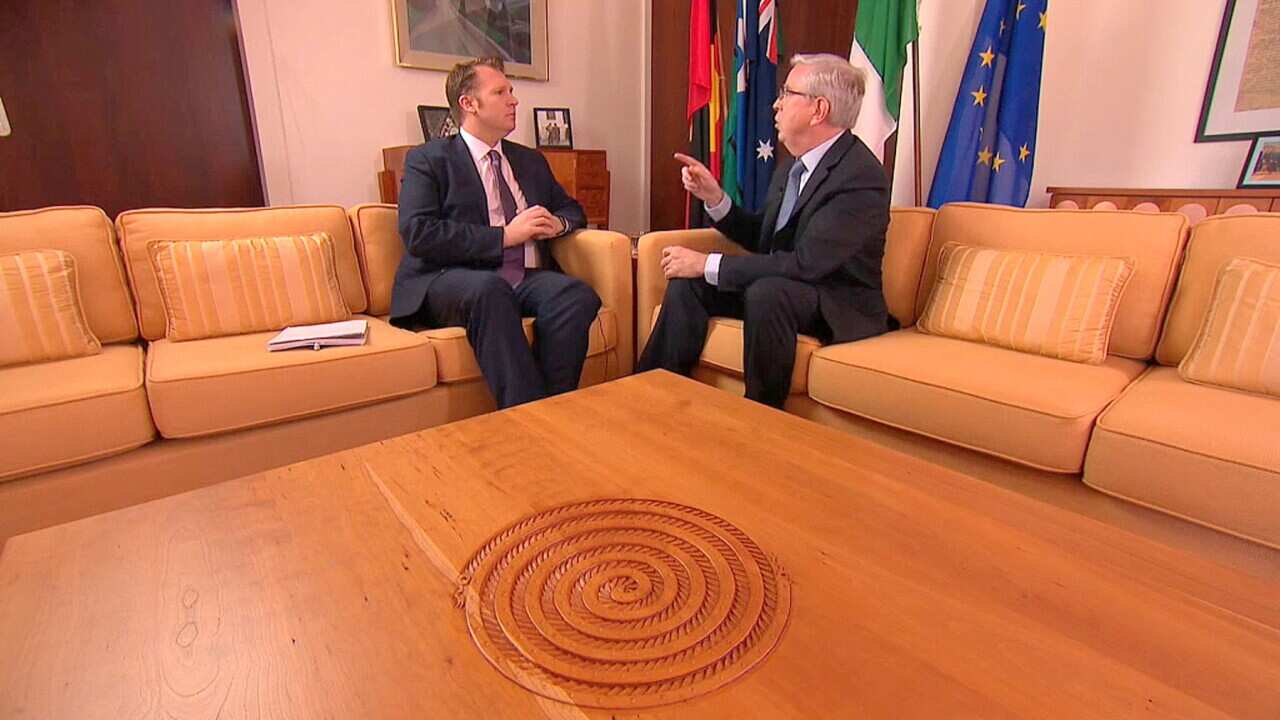 Pat Cox (right) talking to SBS's Brett Mason