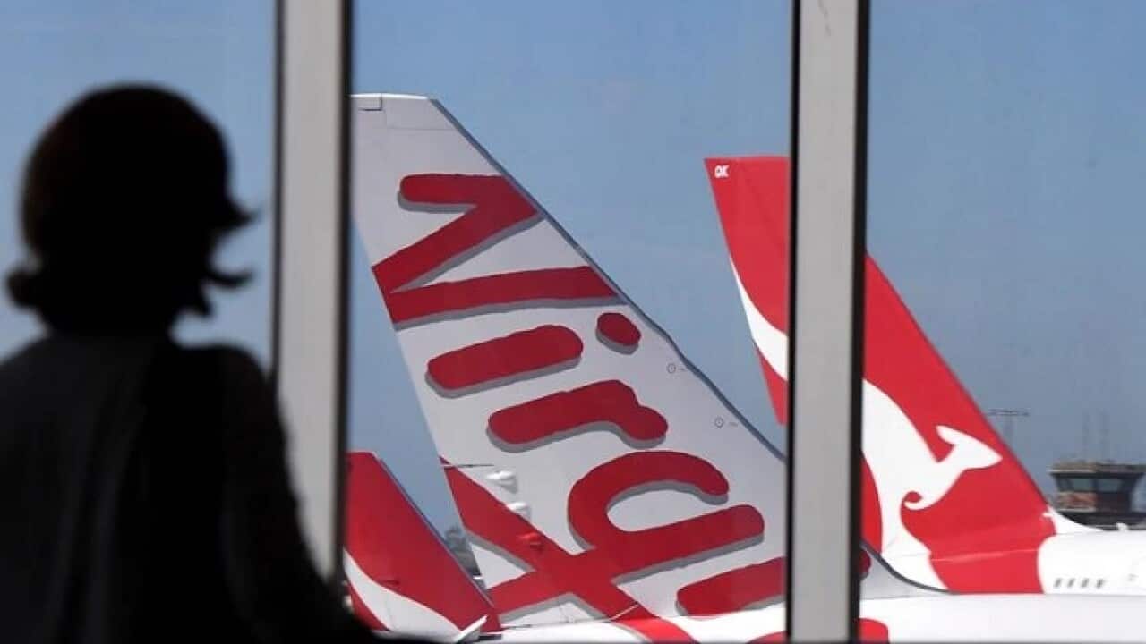 Qantas and Virgin planes seen at Sydney airport.