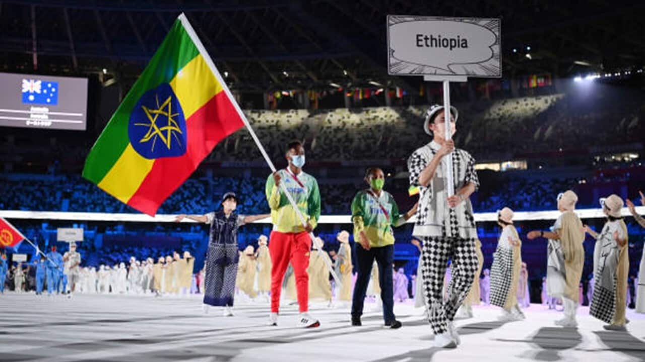Flag bearer Abdelmalik Muktar of Team Ethiopia during the Opening Ceremony of the Tokyo 2020 Olympic Games at Olympic Stadium on July 23, 2021 in Tokyo, Japan.
