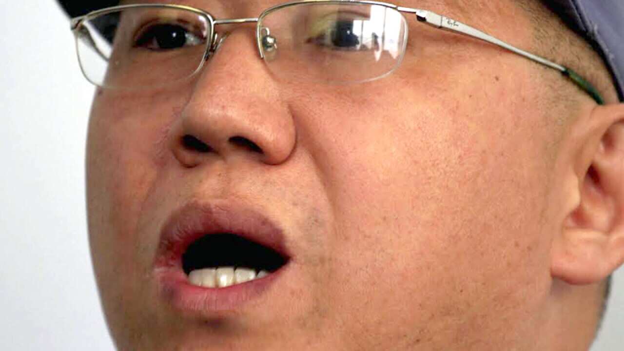US missionary Kenneth Bae speaks to reporters in Pyongyang