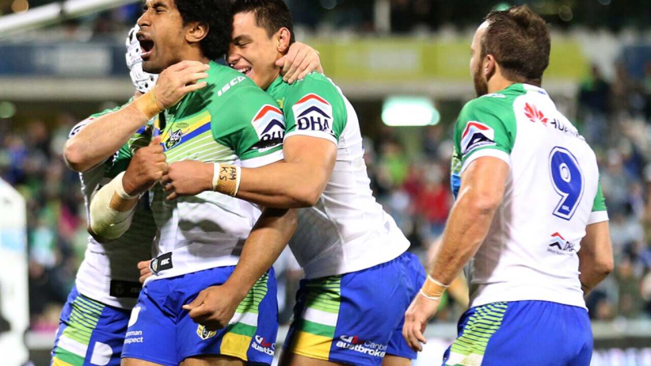 Iosia Soliola of the Raiders (left)