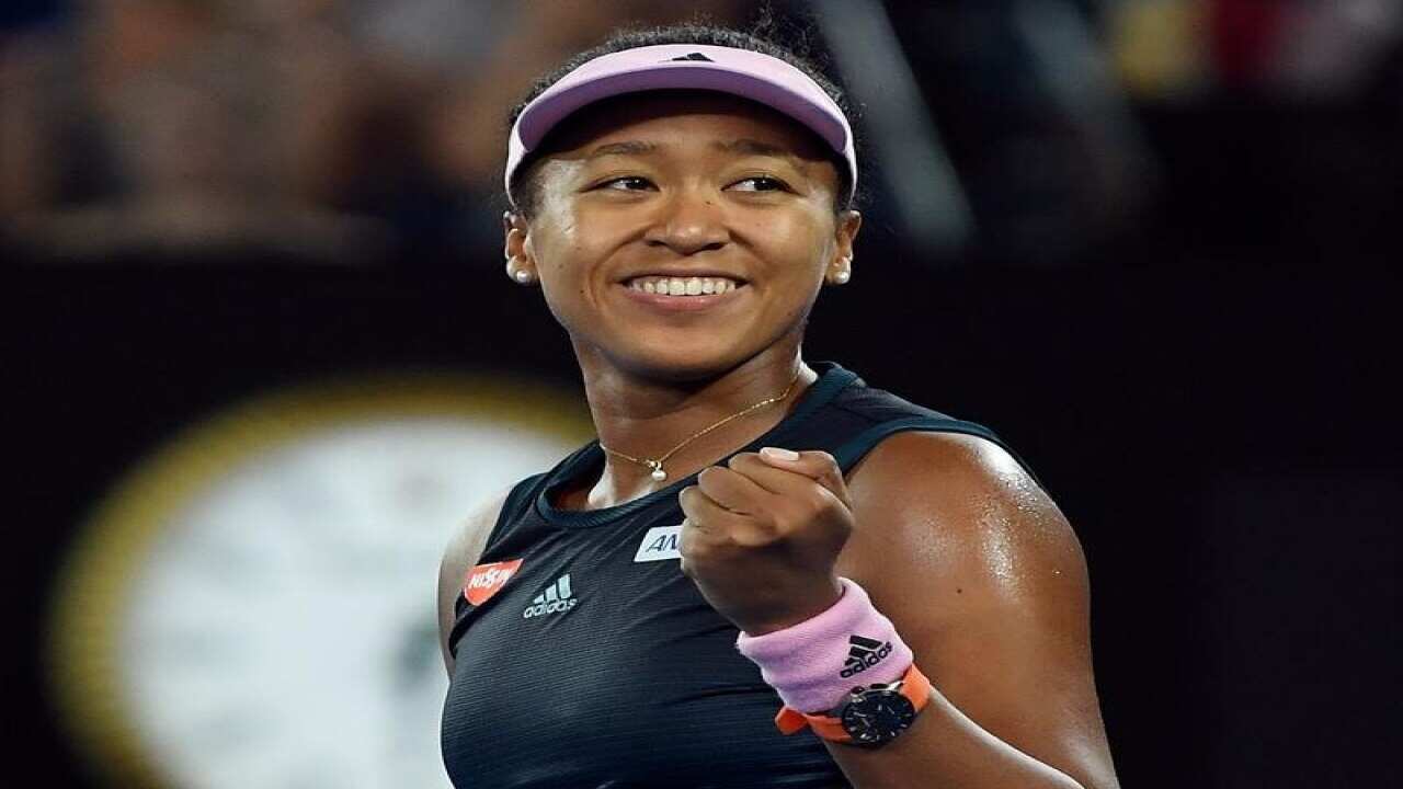 Naomi Osaka of Japan celebrates.