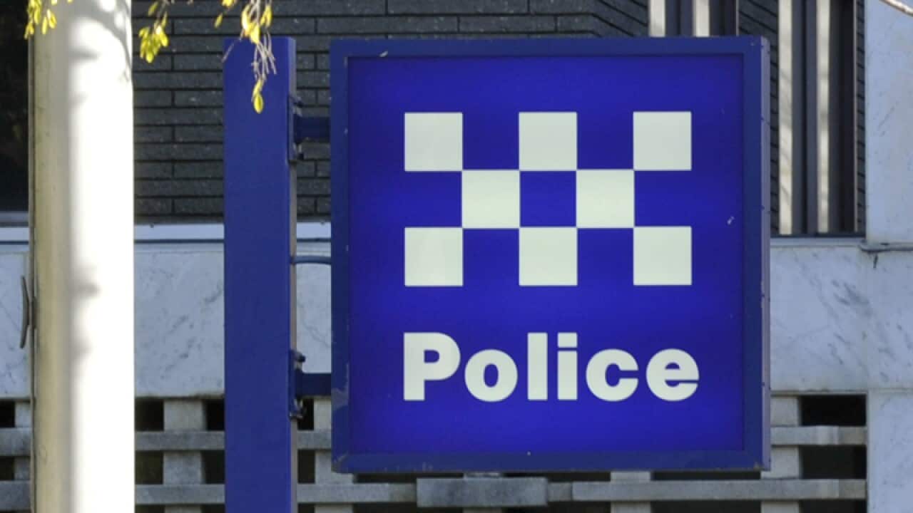 A police station sign