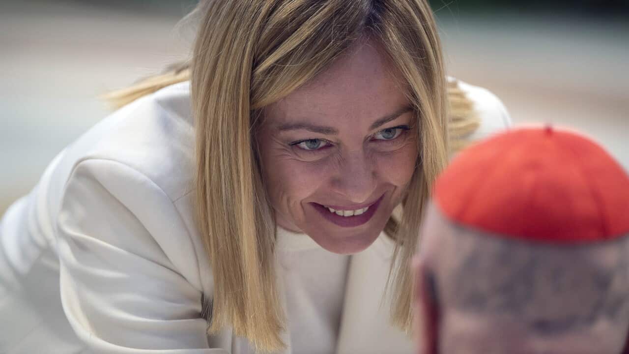 Italian Premier Giorgia Meloni attends a mass