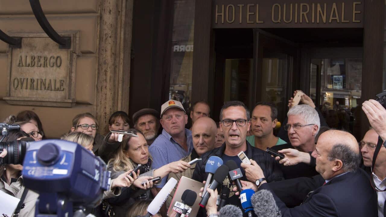 David Ridsdale talks to reporters outside of the Quirinale hotel after their meeting with Australian cardinal George Pell
