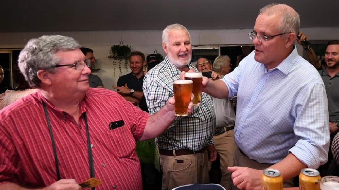 Prime Minister Scott Morrison (right)