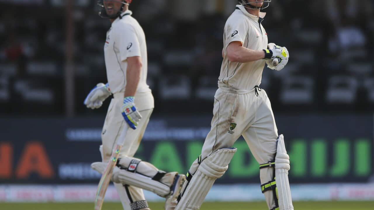 Australian batsmen Shaun Marsh (L) and Steve Smith