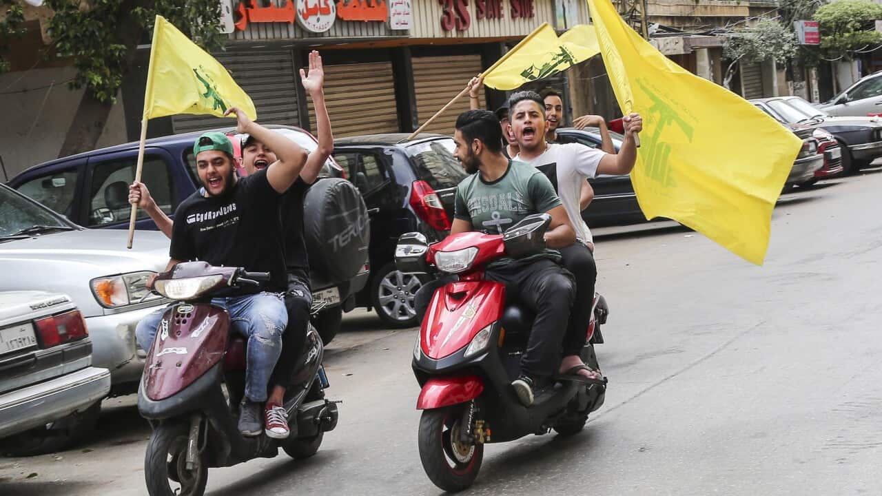 Supporter of Hezbollah carry their party flags and ride motorcycles at the southern suburb of Beirut, Lebanon, 06 May 2018.