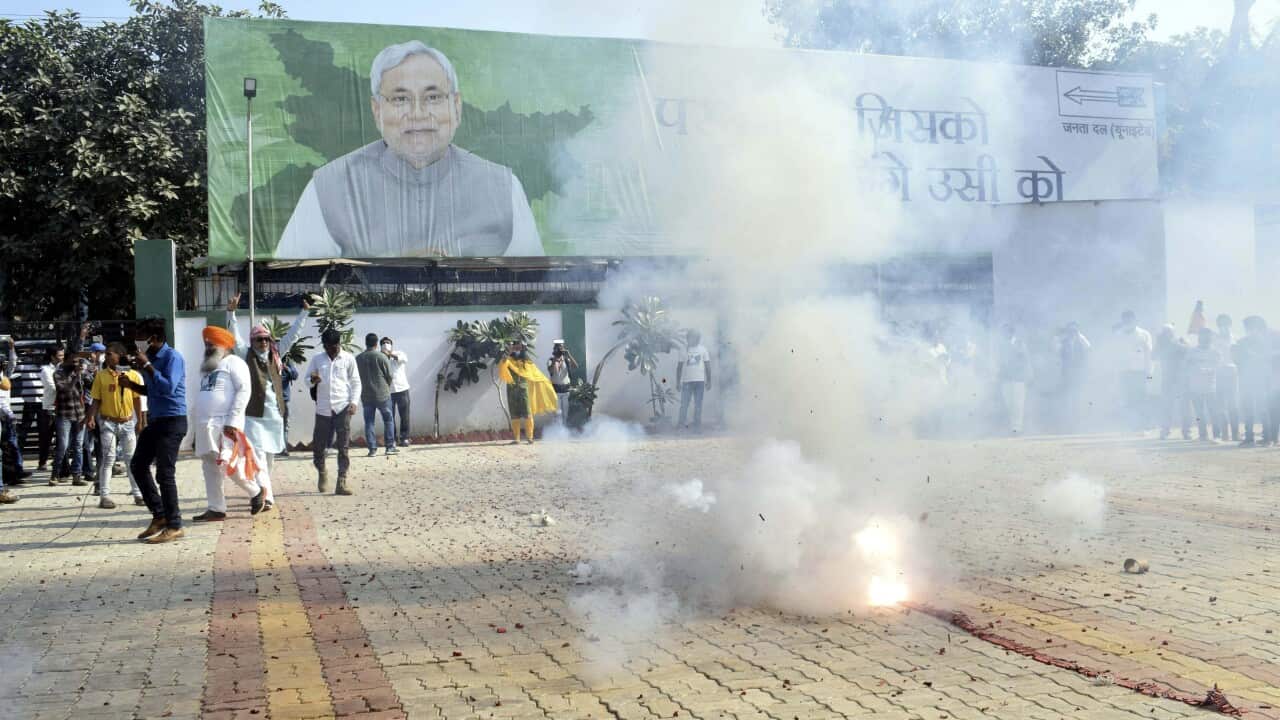 JDU supporters celebrate NDA's lead during the counting of votes for the Bihar Assembly Elections results, in Patna, Tuesday, Nov 10,2020