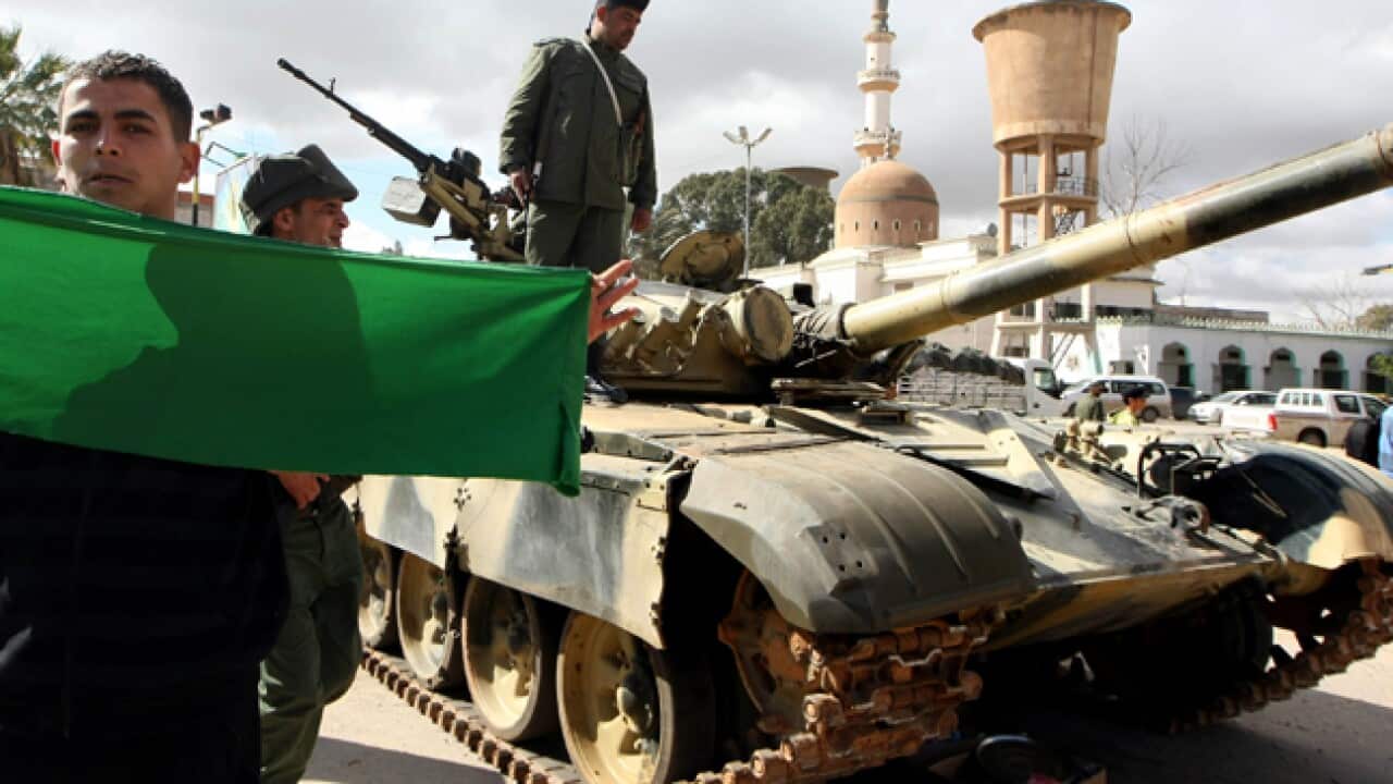 LIBYA-govt_L_supporter_110302_getty_929849056