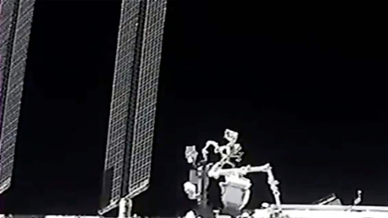 This image made from NASA TV shows the international space station, seen from the SpaceX Crew Dragon spacecraft Saturday, April 24, 2021