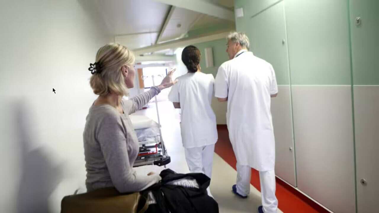 Woman in hospital corridor Source: Getty / BSIP/UIG