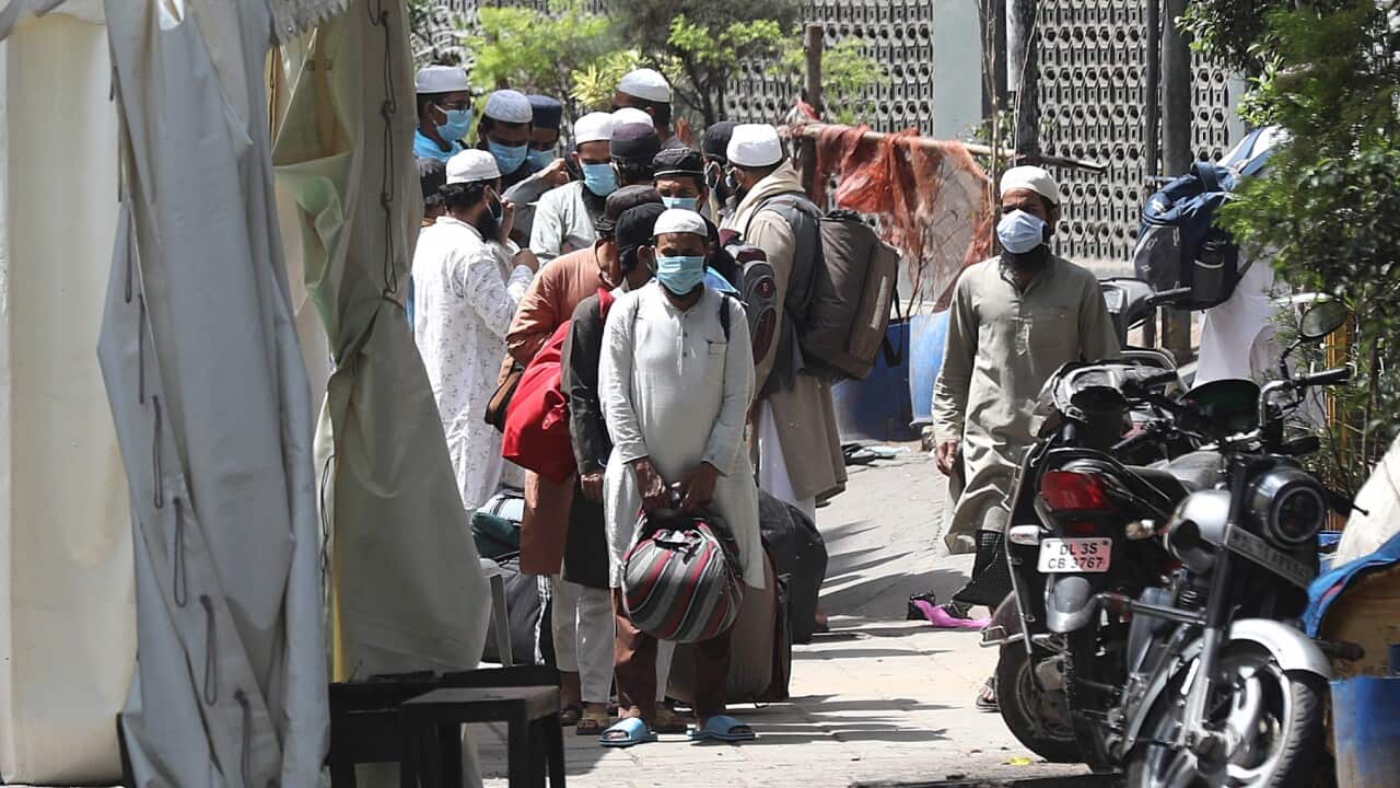 People who attended a religious congregation leave on their way to hospitals and to the quarantine centers from Nizamuddin, New Delhi, India