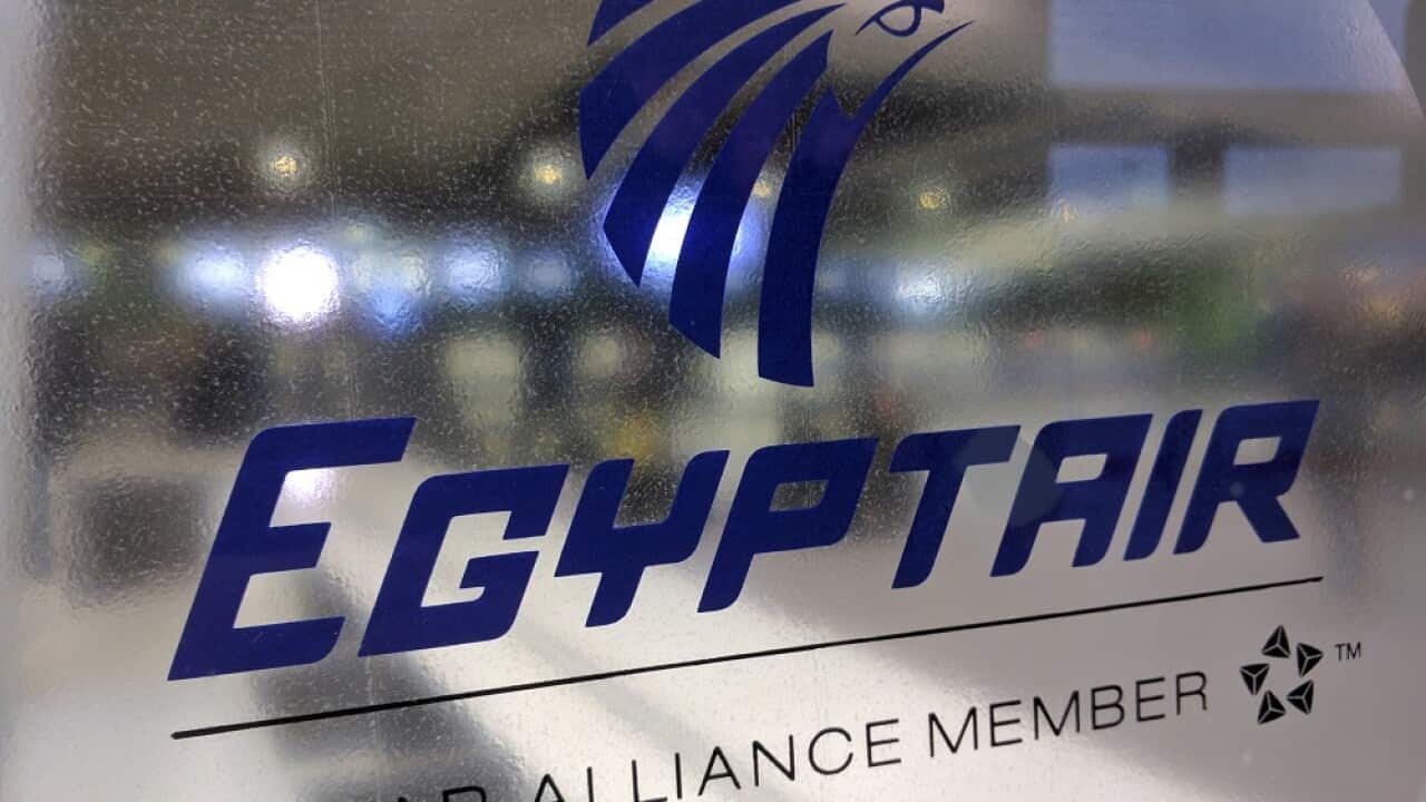 A frosted glass partition is seen at the EgyptAir counter at Charles de Gaulle Airport outside Paris, France, Thursday, May 19, 2016. EgyptAir said a flight from Paris to Cairo disappeared from radar early Thursday morning. (AP Photo/Raphael Satter)