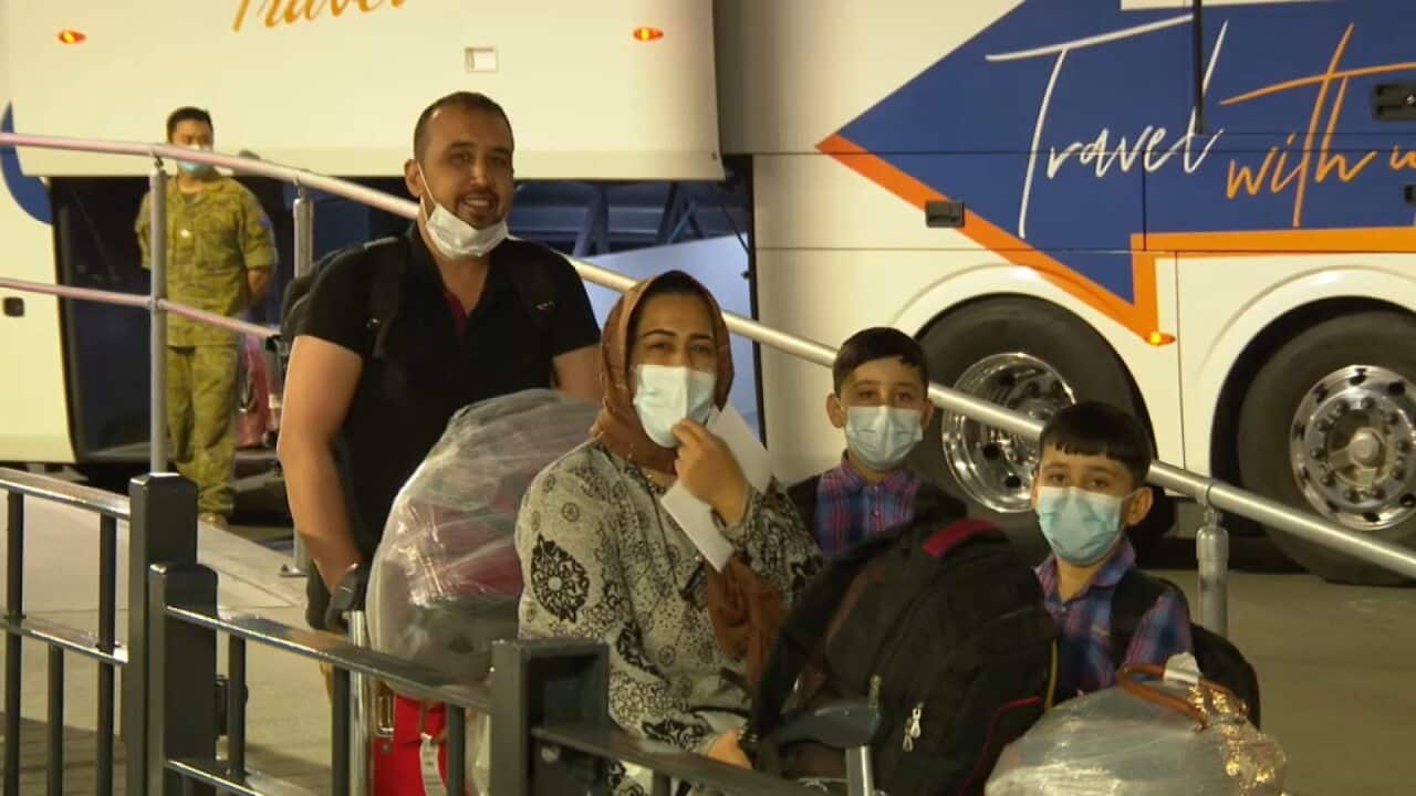 The first group of Afghan interpreters and their families have arrived in Australia.