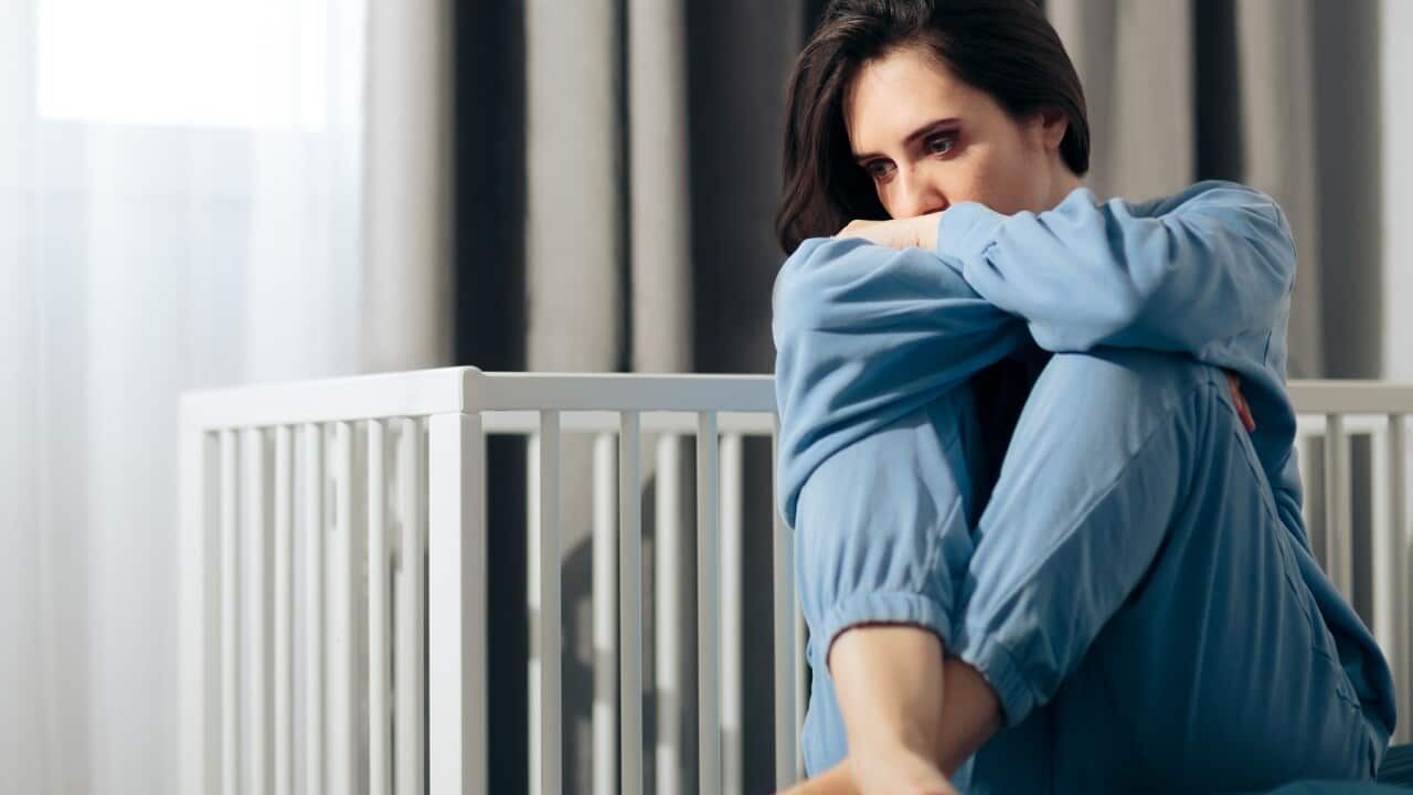 Unhappy Woman Suffering from Post-Partum Depression