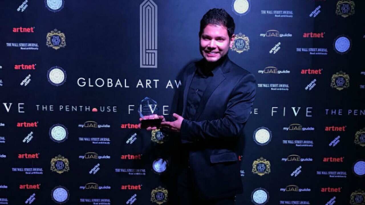 Julian Clavijo colombian artist resident in Melbourne, with his prize
