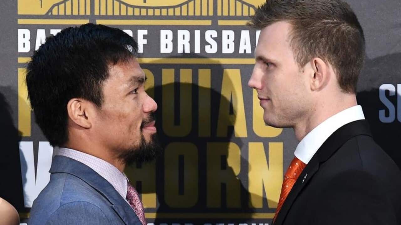 Filipino boxer Manny Pacquiao (L) and Australian boxer Jeff Horn