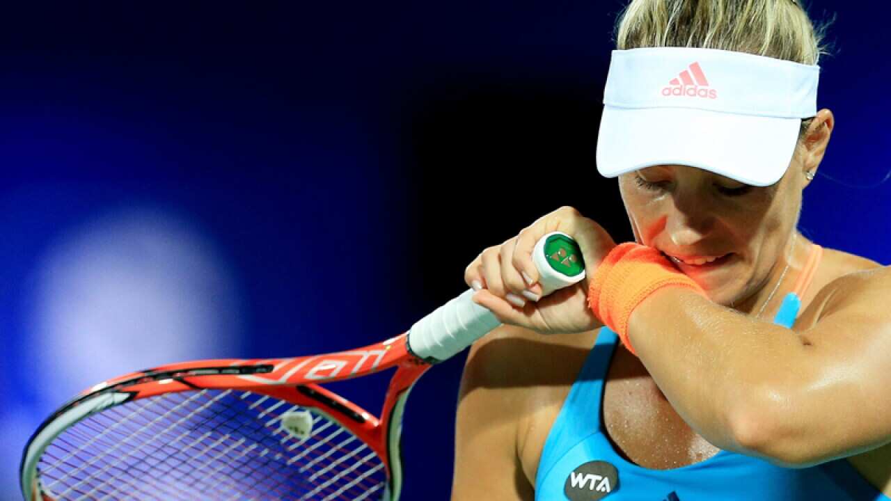 Angelique Kerber of Germany reacts against Elina Svitolina